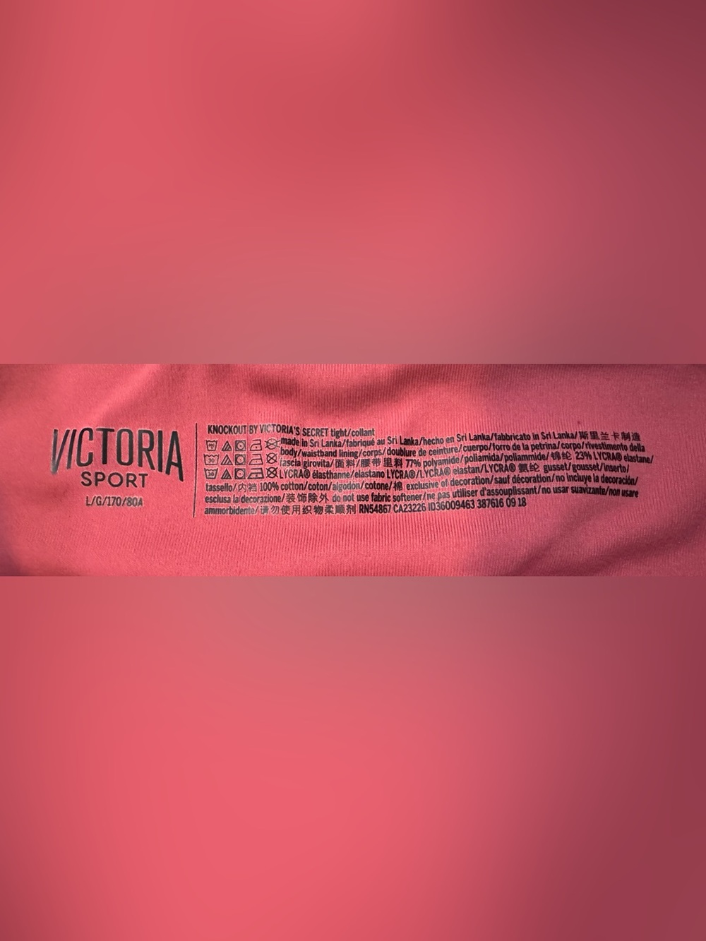 Victoria Secret the Knockout Coral Pink Criss Cross Leggings Size Large - Picture 7 of 13